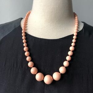 Vintage peach colored beaded necklace